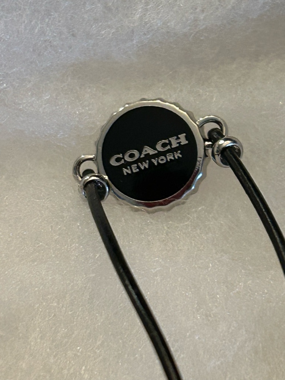 Coach Enamel Bottle Cap Black Leather Adjustable Bracelet - Picture 2 of 5